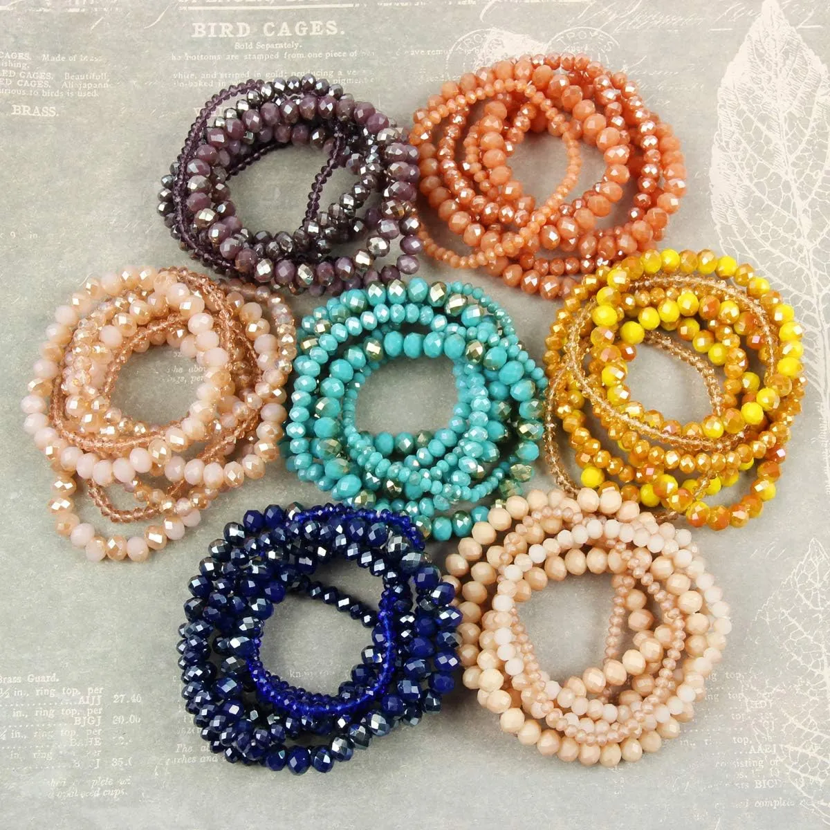 RIAH FASHION Bohemian Multi-Layer Beaded Stacking Statement Bracelets - Versatile Stretch Strand Sparkly Crystal Beads Wrap Slip-on Cuff Bangle Set